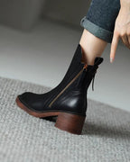 Valorine™ | Black leather boots with a comfortable heel, elegant and timeless.