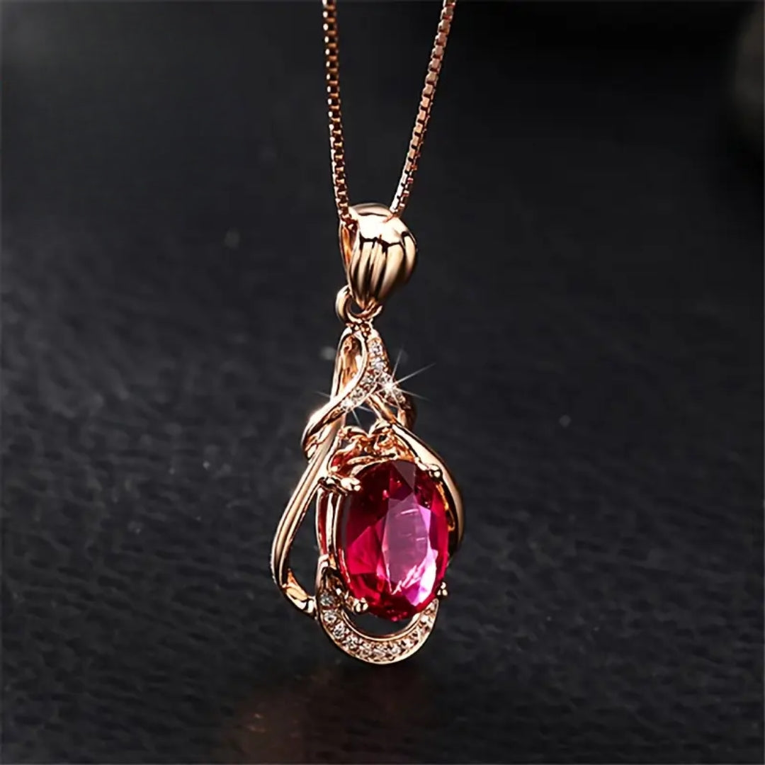 Elegant Gold Necklace with Red Crystals