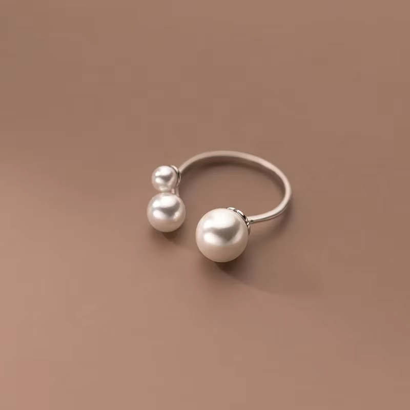 Elegant Triple Pearl Ring